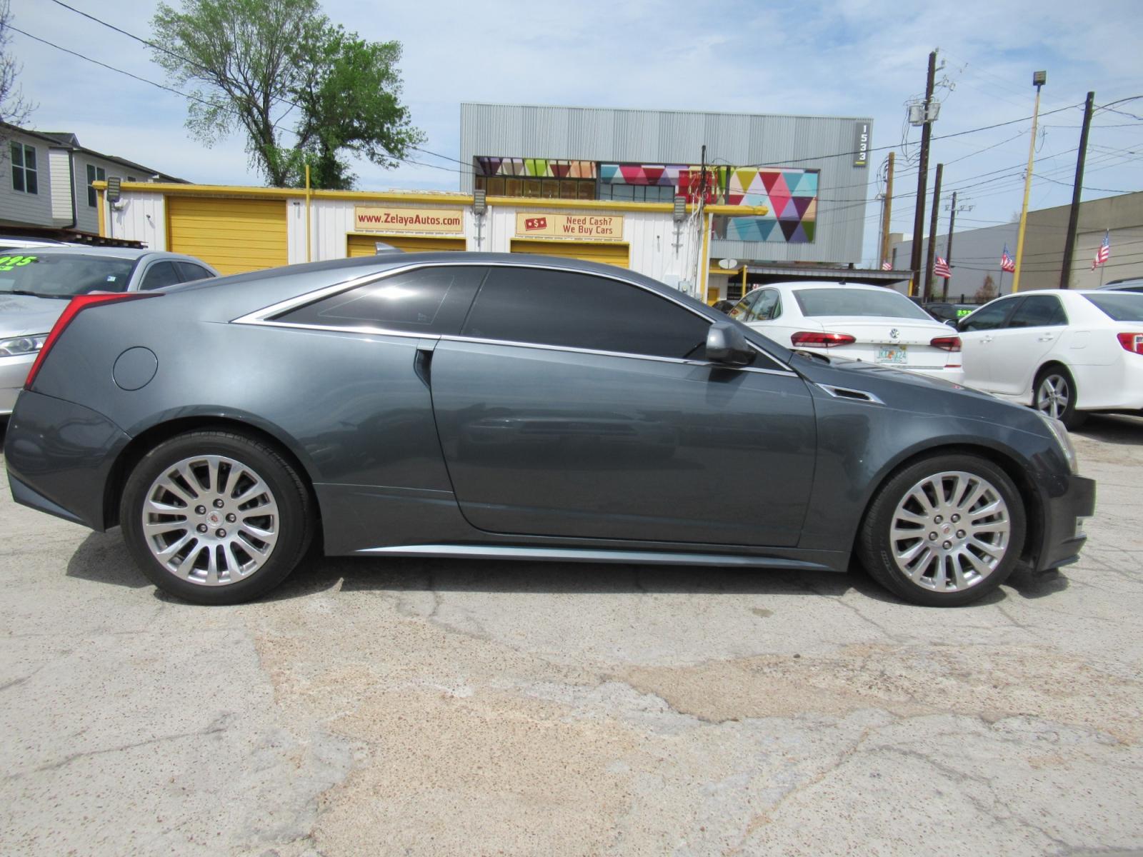 2011 Gray /Black Cadillac CTS CTS PREMIUM (1G6DS1ED5B0) with an 3.6L V6 F DOHC 24V engine, Automatic transmission, located at 1511 North Shepherd Dr., Houston, TX, 77008, (281) 657-1221, 29.798361, -95.412560 - 2011 CADILLAC CTS 3.6L PREMIUM VIN: 1G6DS1ED5B0134957 1 G 6 D S 1 E D 5 B 0 1 3 4 9 5 7 COUPE 3.6L V6 F DOHC 24V GASOLINE ALL WHEEL DRIVE - Photo #0